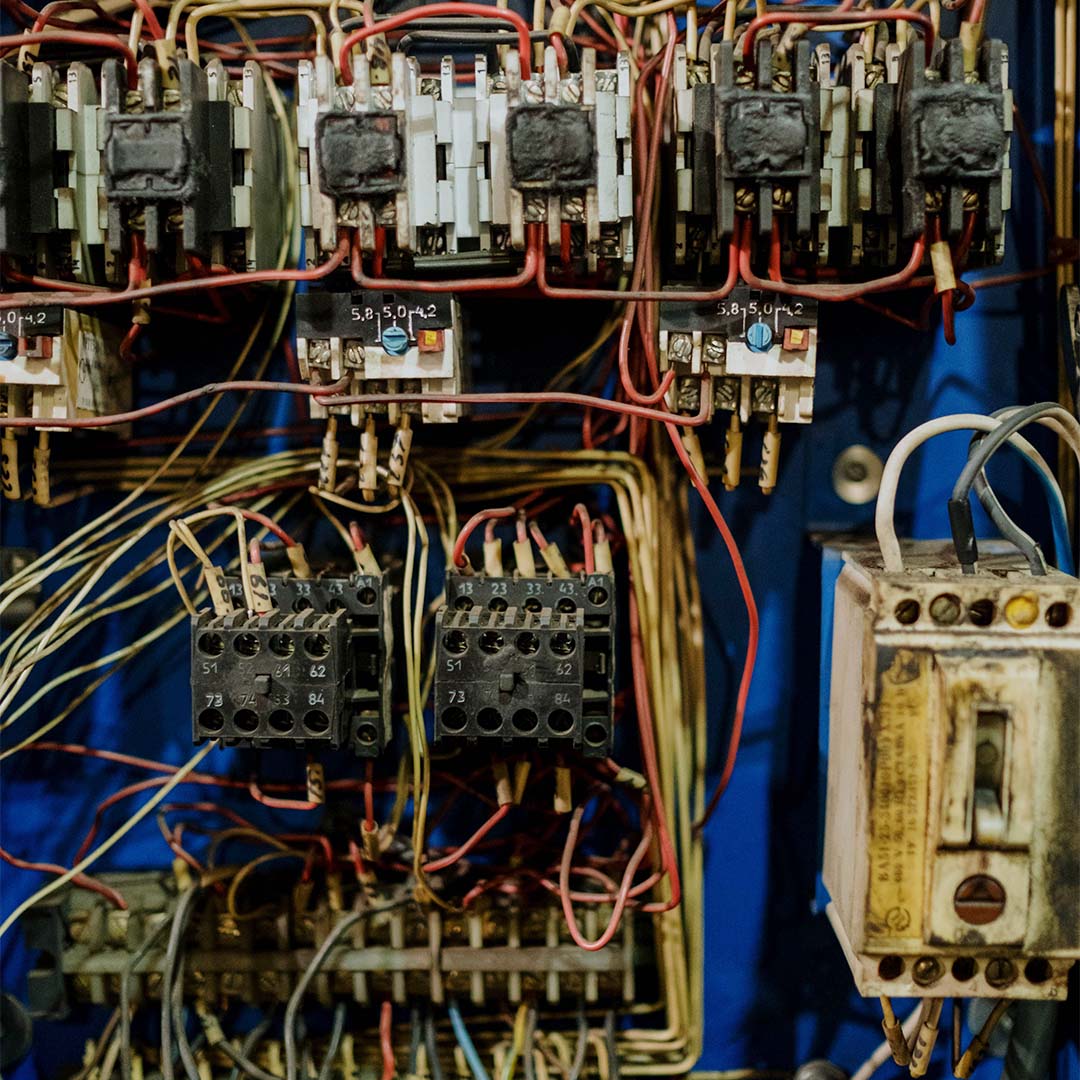 old electrical panel with wires